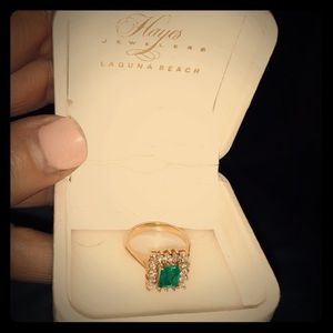 Genuine Emerald and diamond yellow gold ring.